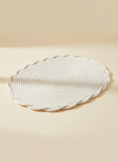 Large 30cm ivory white braided cotton trivet for protecting dining tables from hot pots.