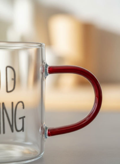 Close-up of the heat-resistant borosilicate glass and bold 'Good Morning' text on the mug.