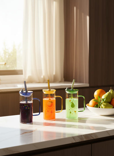 Colorful glass mugs with blueberry, orange, and pear designs, perfect for family juices and drinks in Egypt.