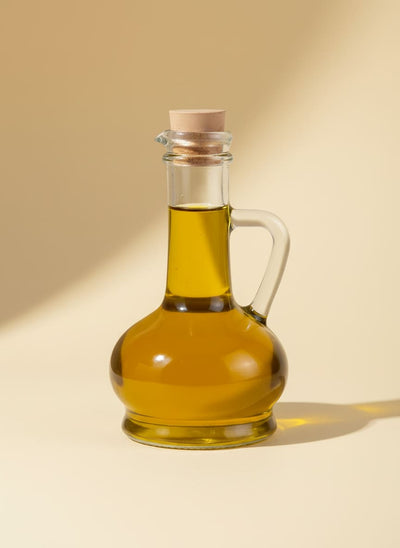 Elegant 350ml glass oil and vinegar cruet with a natural cork stopper, perfect for Egyptian kitchens.