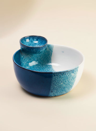 Blue and white ceramic 2-in-1 chip and dip serving bowl with a reactive ocean glaze finish.