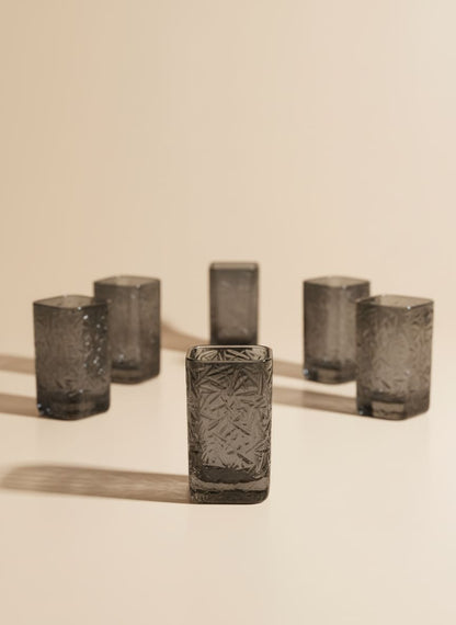 Set of six 250ml square smoke glass drinking cups with a textured geometric pattern on a white background.