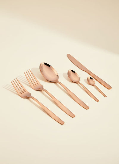 Complete 24-piece rose gold cutlery set with elegant gift box, available for delivery in Egypt.