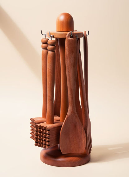 Complete wooden kitchen utensil set with a rotating carousel stand.
